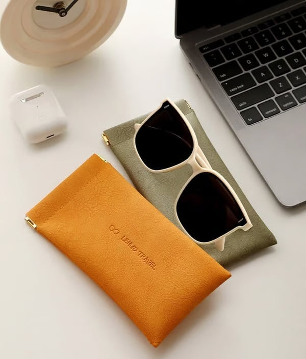 Custodia organizer in pelle con chiusura a scatto